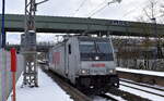 Lotos Kolej Sp. z o.o., Gdańsk [PL] mit der Railpool Lok  E 186 276-2  [NVR-Nummer: 91 80 6186 276-2 D-Rpool] am 14.02.25 Durchfahrt Bahnhof Berlin Hohenschönhausen.