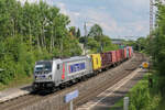 METRANS 187 513 durchfährt mit einem Containerzug Hagenbüchach gen Würzburg.