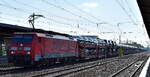 DB Cargo AG, Mainz mit ihrer  189 059-9  [NVR-Nummer: 91 80 6189 059-9 D-DB] und einem PKW-Transportzug (u.a. fabrikneue AUDI PKW Modelle) Richtung Frankfurt/Oder am 29.08.24 Höhe Bahnhof Schönefeld b Berlin.