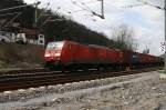 189 013-6 ist am 17.4.2012 mit einem Containerzug in die Tschechei unterwegs. Hier kurz vor dem Bahnhof Rathen im Elbsandsteingebirge.