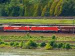 189 067-2 und 189 040-9 der DB Schnker Rail mit Erzzug fahren am 04.07.2012  auf der linken Rheinseite, gegenber von Unkel (bei Rheinkilometer 636), aufwrts in Richtung Koblenz.Auffllig ist hier