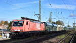 Westfälische Landes-Eisenbahn GmbH, Lippstadt (WLE) mit ihrer 189´er   WLE 81  (NVR:  91 80 6189 801-4 D-WLE ) und einem Schüttgutwagenzug am 07.11.23 Vorbeifahrt Bahnhof Magdeburg