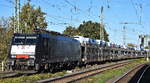 Akiem Lok  ES 64 F4-208  [NVR-Nummer: 91 80 6189 208-2 D-AKIEM], aktueller Mieter? mit einem PKW-Transportzug am 15.10.24 Höhe Bahnhof Magdeburg Neustadt.