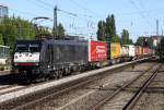 Die 189 992-1 / ES 64 F4 - 092 zieht einen Containerzug durch Mnchen Heimeranplatz am 08.09.2012