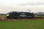 Mit einem Containertragwagenzug mit einem Container fhrt die ERS Railway 189 991 gen Gubberath ber die Kbs 465.....am Freitag 11.1.2013