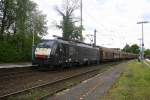 189 114 von MRCE kommt  mit einem lagen Papierleerzug aus Modena(I) nach Dortmund-Scharnhorst(D) und fährt in Richtung Köln. Aufgenommen auf der Rechten Rheinstrecke (KBS 465) in Rhöndorf(am Rhein). 
Bei Sonne und Wolken am Nachmittag vom 29.4.2015.