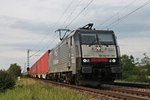 Am 12.05.2015 bespannte die ES 64 F4-201 (189 201-7)  ERS Railways/KOOS  den  Weil am Rhein -Shuttle (Rotterdam Waalhaven - Weil am Rhein Ubf), als sie bei Hügelheim ihrem Ziel entgegen fuhr.