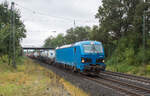 192 010-7 am 12.09.2024 mit einem Aufliegerzug bei Kerzell.