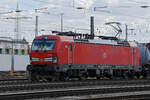 Siemens Vectron 193 352-2 der DB durchfährt den badischen Bahnhof. Die Aufnahme stammt vom 25.02.2022.