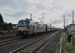 193 862 mit einem Selbstentladerzug am Haken bei der Durchfahrt in Lintorf. 13.1.2018