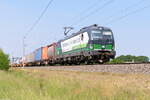 193 727-5 RTB Cargo mit einem Containerzug in Nennhausen und fuhr weiter in Richtung Wustermark.