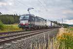 X4E -660 ist am 11.07.2018 mit einen Aufliegerzug in Richtung Würzburg bei Dörflein unterwegs.