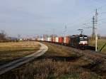 Die X4E-602 mit einem Containerzug am 17.03.2019 unterwegs bei Rutzing.