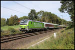 Am Ortsrand von Hasbergen ist hier am 14.09.2019 um 14.54 Uhr die Vectron Lok 193827-3 mit dem Flix nach Köln unterwegs.