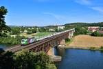 193 219 mit einem leeren Holzzug am 22.07.2020 bei Mariaort.