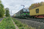 193 264-9 mit einen Aufliegerzug am 20.10.2021 in Vollmerz.