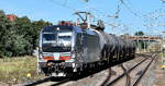 Railpool Lok  6193 119  [NVR-Nummer: 91 80 6193 119-5 D-Rpool], aktueller Mieter? und einem Kesselwagenzug am 21.09.23 Höhe Bahnhof Roßlau (Elbe).