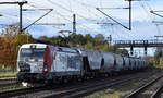 ŽSSK Cargo - Železničná spoločnosť Cargo Slovakia a.s., Bratislava [SK] mit der Vectron  193 844  [NVR-Nummer: 91 80 6193 844-8 D-LTEU] und einem Getreidezug am 07.11.23