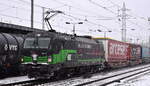 TX Logistik AG, Troisdorf [D] mit der ELL Vectron  193 274  [NVR-Nummer: 91 80 6193 274-8 D-ELOC] und KLV-Zug aus Rostock Seehafen am 29.11.23 Höhe Bahnhof Flughafen BER Terminal 5.