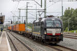 Beacon Rail X4 E - 607 mit einem Containerzug am 2.