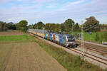 Railpool 193 994-1 fährt mit einer weiteren 193 und einem Autozug durch den Haltepunkt Pulling in Richtung München. (29.09.2023)