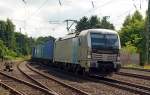 193 804 schleppte am 30.06.14 einen Containerzug durch Buchholz(Nordheide) Richtung Tostedt.