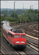 110 484-3 zog am 17.07.2008 eine RB von Donauwrth nach Aalen. Hier fhrt der Zug gerade in den Bahnhof Aalen ein.
