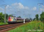 Wissenschaftlok 110 325-8 durchfhrt mit einem Sonderzug nach Berlin-Ostbahnhof,die Berliner Wuhlheide (03.07.09)