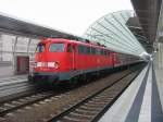 110-320 mit ihrem RE nach Trier am 22.7.2005 beim Halt in Ludwigshafen Mitte.