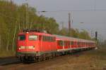 110 418-1 mit der RB 30530 nach Wesel bei der Einfahrt in Dinslaken am 08.04.2011