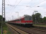 110 438-9 mit RB 31783 Salzbergen-Mnster Hauptbahnhof auf Bahnhof Salzbergen am  10-7-2012.