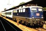 110 228-4 mit SE 8632 Osnabrck-Mnster abfahrtsbreit auf Osnabrck Hauptbahnhof am 09-08-1995.