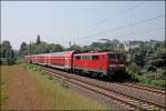 111 118 schiebt bei Wetter(Ruhr) den RE4 (RE 10421)  WUPPER-Express  nach Dortmund Hbf. (08.06.2008)
