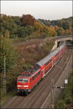 111 128 (9180 6 111 128-5 D-DB) besitzt einen roten Stromabnehmer und ist am 13.10.2008 mit dem RE4 (RE 10420)  WUPPER-Express  nach Aachen unterwegs.