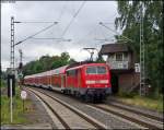 111 158 schiebt ihren RE10420 Richtung Aachen hier neben dem ehem. Stellwerk Ef in Erkelenz 23.7.2009