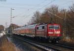 RE10423 nach Dortmund mit Schublok 111 112 an der ehem. Anrufschranke Geilenkirchen 19.12.09