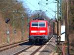 Der RE4 wird am 06.04.2010 von 111 113-7 von Aachen West nach Herzogenrath geschoben.