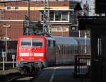 RE11398 nach Kaldenkirchen mit Schublok 111 114 bei der Ausfahrt in Mnchengladbach Hbf 6.4.10