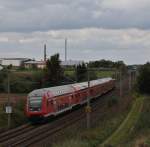 Am 26.09.2010 in Alteglofsheim war 111 201 am Regionalexpress nach Mnchen Hbf.