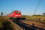 RE4 nach Aachen auf dem Bahnbergang in der Schley/am Chur gezogen von der 111 080 am Freitag den 7.9.2012 