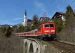 111 005 mit einer RB nach Innsbruck am 16.03.2013 am Gurgelbach-Viadukt nahe Reith bei Seefeld.