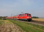 Die 111 057 mit einem RE nach Mnchen am 08.10.2013 unterwegs bei Batzhausen.
