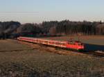 Die 111 175 mit einem RE nach Salzburg am 14.12.2013 unterwegs bei Bad Endorf.