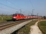 Die 111 043 mit einem M nach München am 07.03.2014 unterwegs bei Teisendorf.