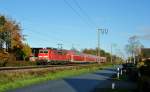 111 135-0 fuhr am 13.11.2013 mit einem RE von Emden nach Bremen, hier in Leer.