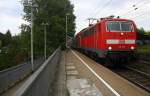 111 169 DB kommt die Kohlscheider-Rampe hoch aus Richtung Neuss,Herzogenrath mit dem RE4 aus Dortmund-Hbf-Aachen-Hbf und fährt durch Kohlscheid in Richtung Richterich,Laurensberg,Aachen-West. 
Bei Sonne und Wolken am Morgen vom 28.5.2015.