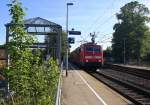 111 149 DB kommt die Kohlscheider-Rampe hoch aus Richtung Neuss,Herzogenrath mit dem RE4 aus Dortmund-Hbf-Aachen-Hbf und fährt durch Kohlscheid in Richtung Richterich,Laurensberg,Aachen-West.
An einem schönem Sommermorgen vom 17.6.2015.