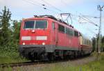 111 020-4 mit AKE-Sonderzug 99 von Ostseebad Binz nach Koblenz Hbf bei der Durchfahrt in der Gterumgehung Hhe Rostock Hbf.28.06.2015