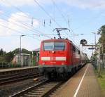 Ein Nachschuss von der 111 016 DB schiebt den RE4 aus Aachen-Hbf nach Dortmund-Hbf und kommt aus Richtung Aachen-West,Laurensberg,Richterich, und fährt durch Kohlscheid in Richtung
