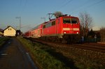 111 118-6 mit einem RE4 nach Aachen Hbf bei Wickrath. 29.3.2016